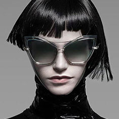 Woman wearing dark designer glasses from C Eyewear